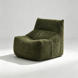 A modern low-profile lounge chair upholstered in ribbed olive green corduroy fabric, shown on a light gray studio background with a soft shadow.