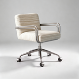 A modern office chair with a cream and beige striped fabric upholstered seat and back, supported by a polished chrome five-star base with casters, set against a neutral gray studio background.