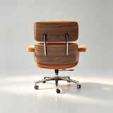 A mid-century modern office chair with a wood-grain upholstered shell and orange-brown fabric cushions, shown from the back on a light gray studio background.