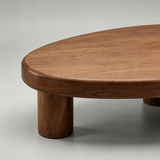 Tavolino da Caffè a Forma di Ciottolo - Piano in Legno Massello con Moderna Base in Metallo