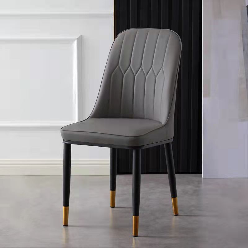 Elegant Faux Leather Dining Chair with Gold-Tipped Legs