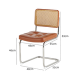 A brown leather dining chair with a woven cane backrest and chrome metal legs, shown with dimension labels and dashed measurement lines on a white background.