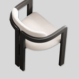 Modern Elegance: Black Frame Dining Chair with Plush Beige Upholstery and Contemporary Design