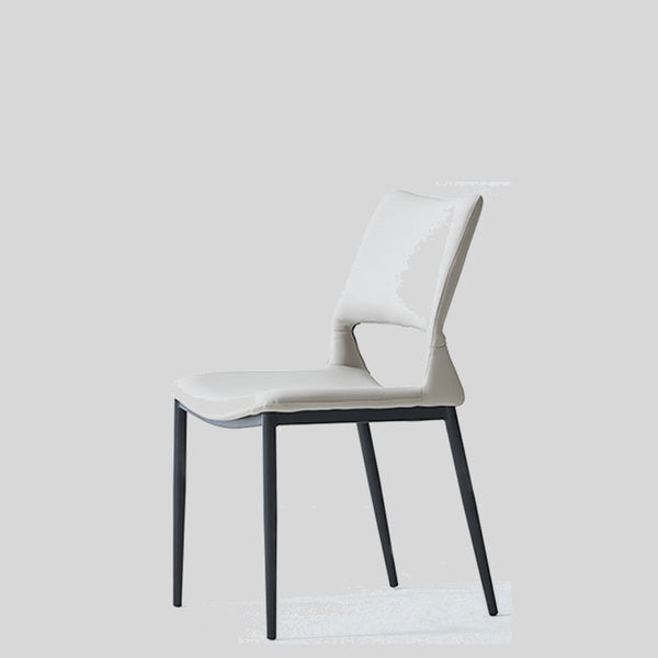 Sleek and Modern: White Leather Dining Chair with Ergonomic Design and Sturdy Black Legs