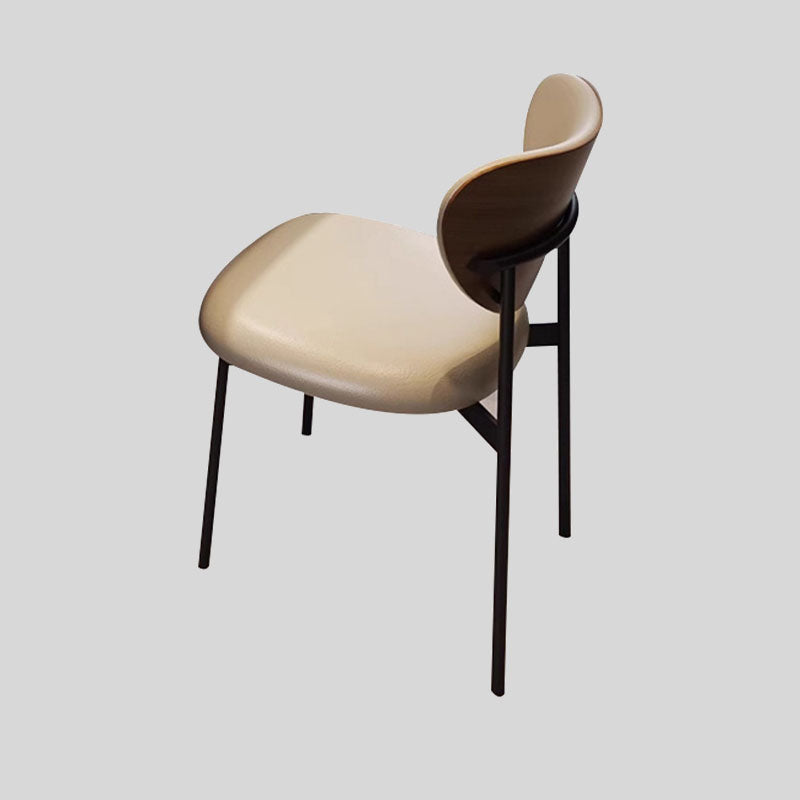 Contemporary Chic: Upholstered Ultra-fiber Leather Dining Chair with Unique Curved Back and Sleek Black Frame