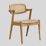 Elegant Rattan and Wood Dining Chair with Cushioned Seat