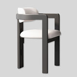 Modern Elegance: Black Frame Dining Chair with Plush Beige Upholstery and Contemporary Design