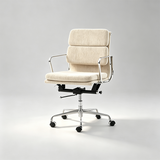 A modern office chair with a cream-colored textured fabric upholstered seat and backrest, supported by a chrome-finished metal base with five wheels.