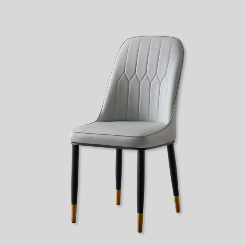 Elegant Faux Leather Dining Chair with Gold-Tipped Legs