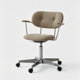 Oatmeal beige office chair with textured upholstery, a buttoned backrest, curved arm pads and a silver castor base.
