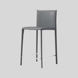 Saddle Leather Counter Stool With Steel Frame and Upholstered Legs.