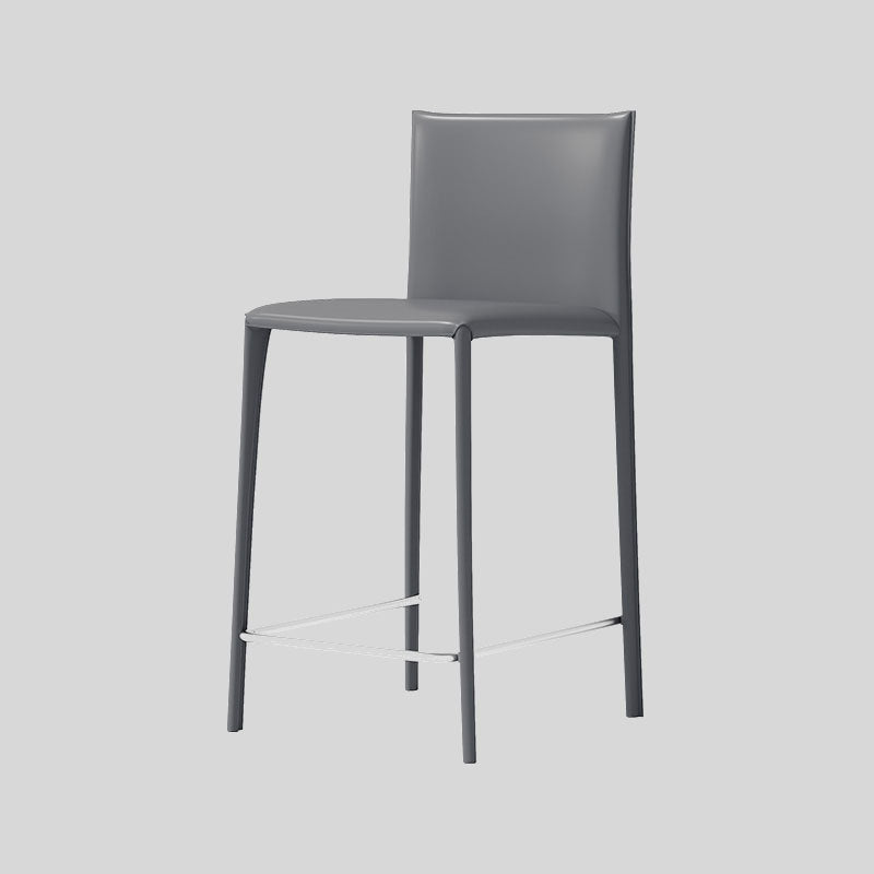 Saddle Leather Counter Stool With Steel Frame and Upholstered Legs.