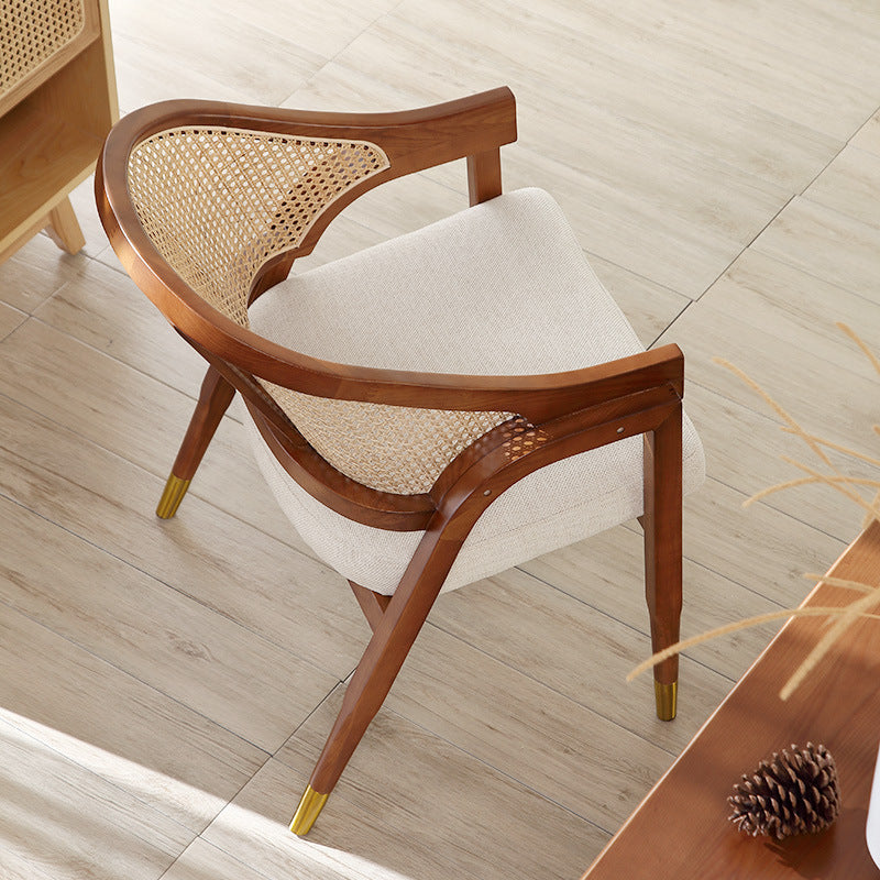 Handcrafted Rattan Chair with Cushioned Seat - A Blend of Elegance and Comfort