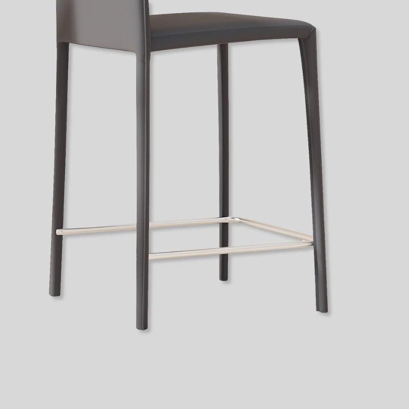 Saddle Leather Counter Stool With Steel Frame and Upholstered Legs.