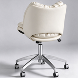 Rear view of the cream office chair showing its curved upholstered back, lower back opening and chrome five-star castor base
