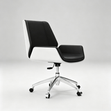 Modern office chair with a black and white upholstered seat and back, mounted on a chrome five-star wheeled base, photographed on a light gray studio background.