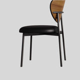 Contemporary Chic: Upholstered Ultra-fiber Leather Dining Chair with Unique Curved Back and Sleek Black Frame