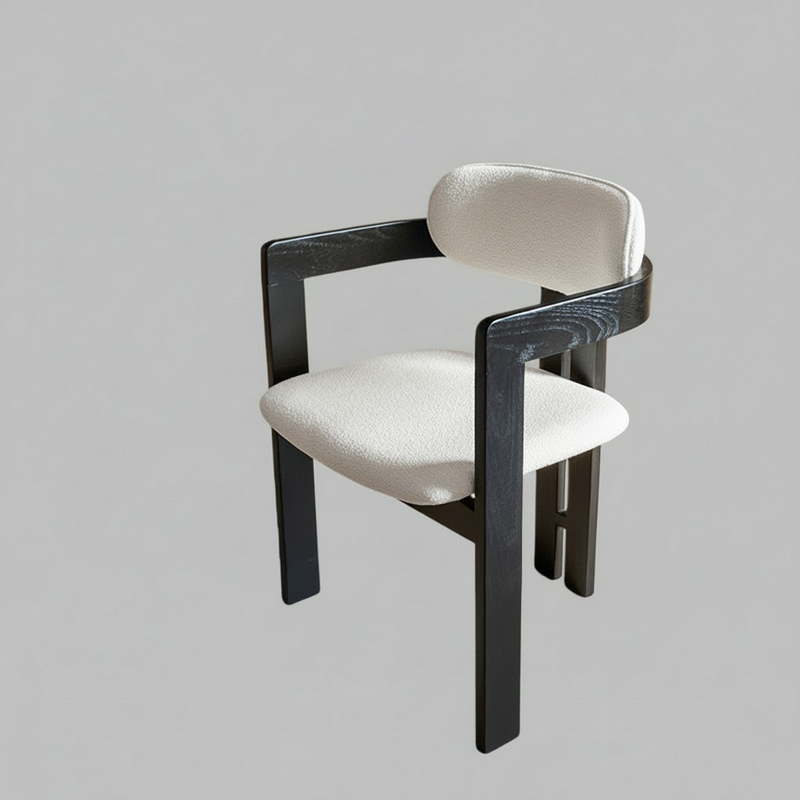 Black Frame Dining Chair with Plush Beige Upholstery and Contemporary Design