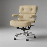 Pale yellow office chair with two button-tufted back cushions, silver arm supports and a castor base.