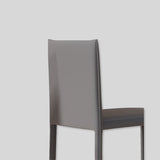 Saddle Leather Counter Stool With Steel Frame and Upholstered Legs.