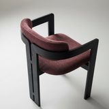 Black Frame Dining Chair with Plush Beige Upholstery and Contemporary Design