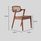 Elegant Rattan and Wood Dining Chair with Cushioned Seat