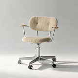Beige boucle office chair with a buttoned backrest, wooden arm pads and a polished five-star castor base.