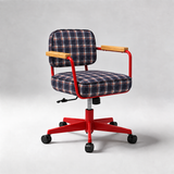 A modern office chair with a red metal frame, black casters, light wood armrests, and a navy blue plaid upholstered seat and backrest, shown against a neutral gray studio background.