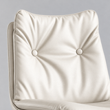 Close-up of the ivory padded backrest showing two covered buttons, gathered upholstery and piped edges.