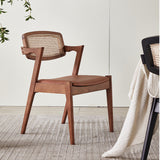 Elegant Rattan and Wood Dining Chair with Cushioned Seat