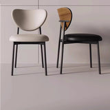 Contemporary Chic: Upholstered Ultra-fiber Leather Dining Chair with Unique Curved Back and Sleek Black Frame