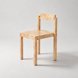 Pale burl-patterned dining chair with a rectangular backrest, square seat and straight legs.
