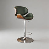 Adjustable height bar stool in green leather showing 360 degree swivel function