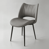 Modern Curved Leather Dinning Chair - Contemporary Comfort for Stylish Spaces - StoolTopia
