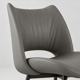 Modern Curved Leather Dinning Chair - Contemporary Comfort for Stylish Spaces - StoolTopia