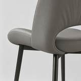 Modern Curved Leather Dinning Chair - Contemporary Comfort for Stylish Spaces - StoolTopia