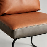 Modern Leather Dining & Vanity Chair – Metal Sled Base, Soft Cushioned Backrest, High-End Minimalist Seating for Dining Rooms, Bedrooms & Contemporary Interiors - StoolTopia