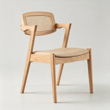 Modern Nordic Rattan & Leather Dining Chair – Solid Wood Frame, Curved Low-Back Design for Cafés, Homes & Boutique Stays - StoolTopia