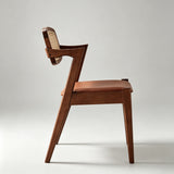 Modern Nordic Rattan & Leather Dining Chair – Solid Wood Frame, Curved Low-Back Design for Cafés, Homes & Boutique Stays - StoolTopia