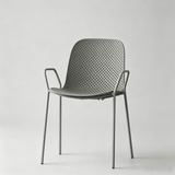 Modern Perforated Plastic Dining Chair with Metal Frame for Contemporary Spaces - StoolTopia