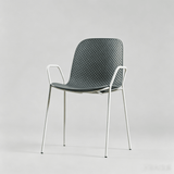 Modern Perforated Plastic Dining Chair with Metal Frame for Contemporary Spaces - StoolTopia