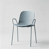 Modern Perforated Plastic Dining Chair with Metal Frame for Contemporary Spaces - StoolTopia