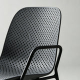 Modern Perforated Plastic Dining Chair with Metal Frame for Contemporary Spaces - StoolTopia
