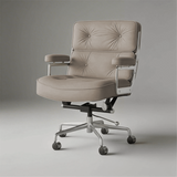 Light greige office chair with two button-tufted back cushions, silver arm supports and a five-star castor base.