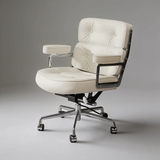 Ivory office chair with two tufted back cushions, padded armrests and a silver five-star base with castors.

