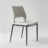 Sleek and Modern: White Leather Dining Chair with Ergonomic Design and Sturdy Black Legs - StoolTopia