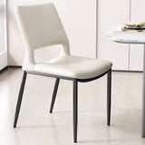 Sleek and Modern: White Leather Dining Chair with Ergonomic Design and Sturdy Black Legs - StoolTopia