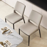 Sleek and Modern: White Leather Dining Chair with Ergonomic Design and Sturdy Black Legs - StoolTopia