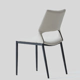 Sleek and Modern: White Leather Dining Chair with Ergonomic Design and Sturdy Black Legs - StoolTopia
