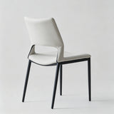 Sleek and Modern: White Leather Dining Chair with Ergonomic Design and Sturdy Black Legs - StoolTopia